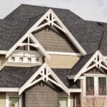 The roof of the house with details of exterior. Street view, nobody.