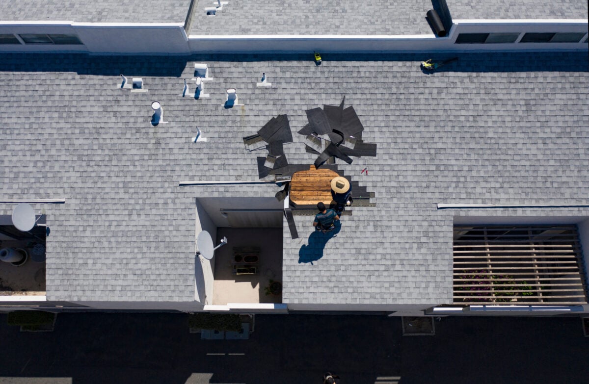 Roof Repair Inspection In Progress Aerial Above Head Condo Building Gray Shingles 2 Roofers