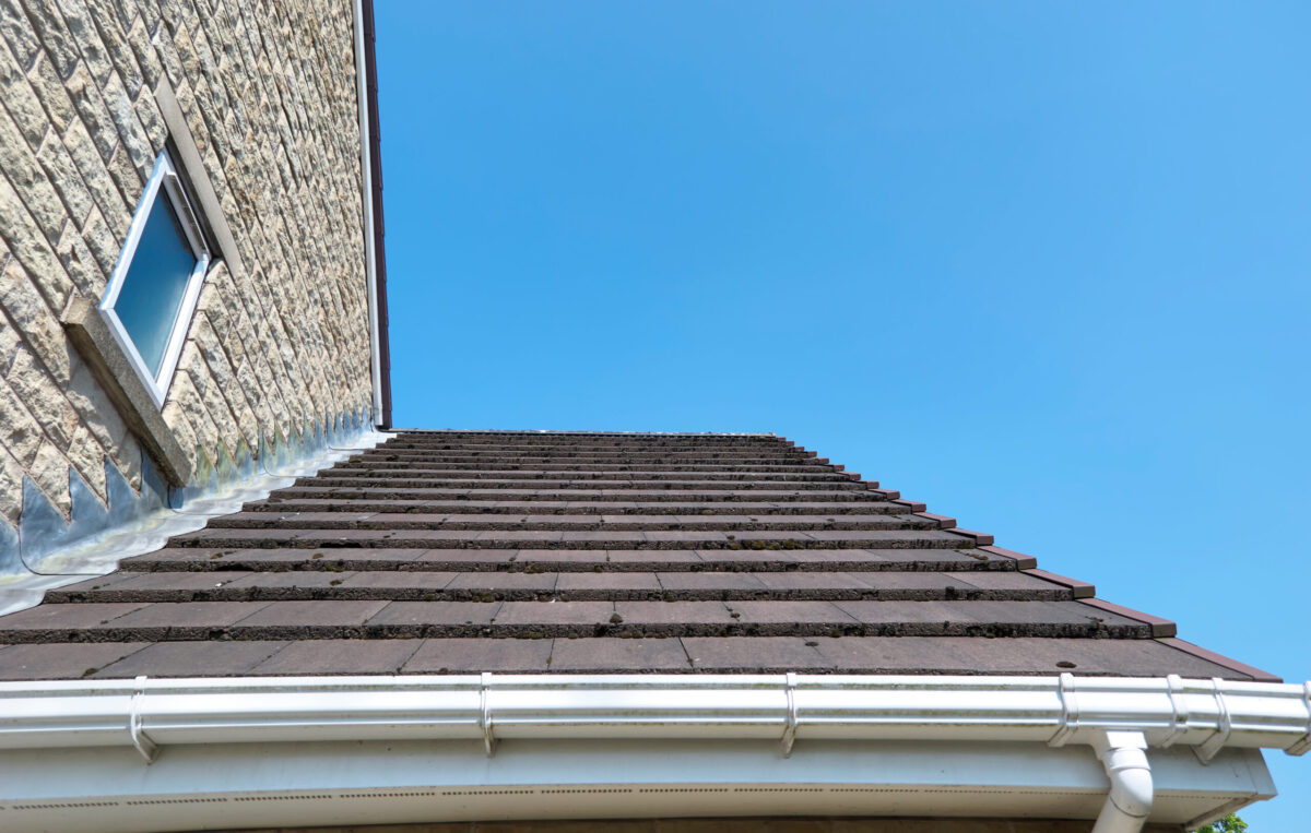 roof flashing A small Tiled Pitch Roof on a new build house in Menston, Yorkshire, with PVC Guttering, Sofits and Lead Flashing.